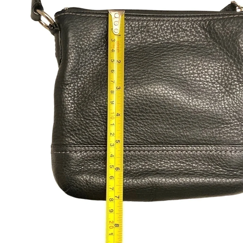 Coach black pebbled leather turnlock swingpack crossbody bag